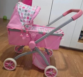 Carro de muñecas rosa