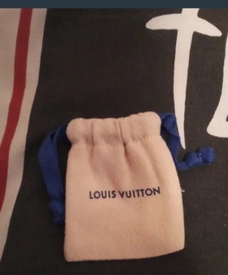 Lucchetto e chiavi Louis Vuitton oro e nero