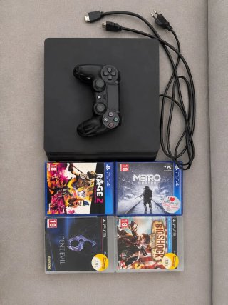 PS4 1TB Nera + 4 Giochi