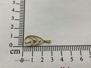 colgante oro 18k con piedra