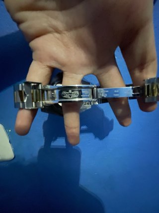 Reloj Rolex Negro y Dorado