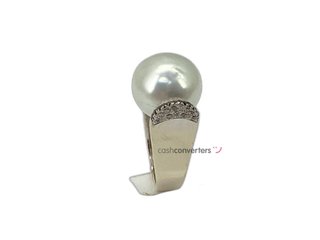 sortija oro 18k con piedra con diamante,perla