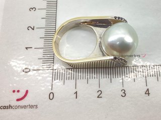 sortija oro 18k con piedra con diamante,perla