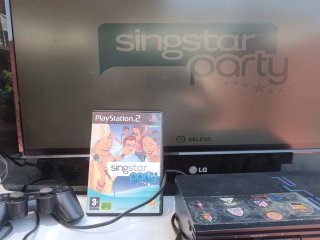 Play2 +  mando, 5 juegos y micrófonos + tele lg 32