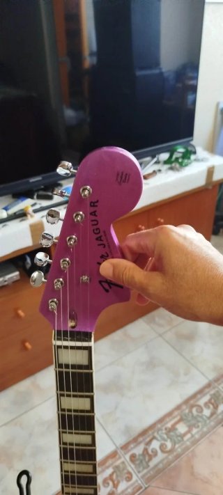Guitarra Jaguar estilo Fender púrpura
