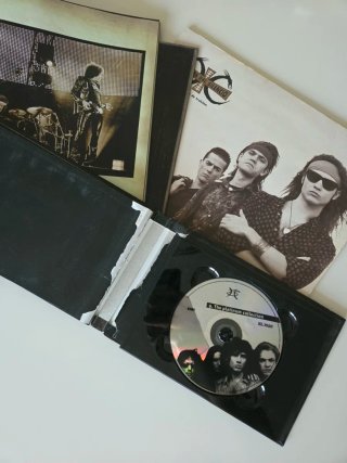 Vinilo y Álbum Fotos Héroes del Silencio
