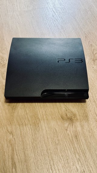 PlayStation 3 Slim + 2 mandos Sony