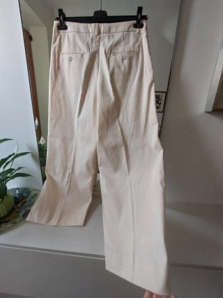 Pantaloni in cotone colore avorio
