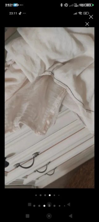 Vestido beige Stradivarius