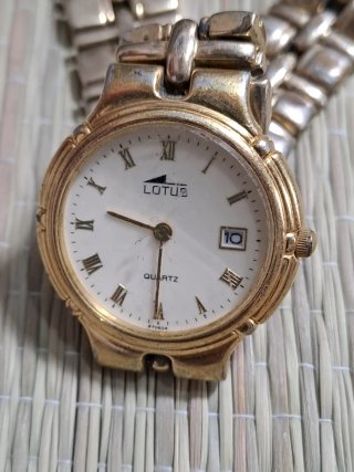 Reloj Lotus Dorado para Reparar