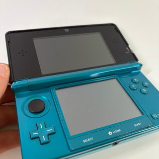 Nintendo 3DS con giochi e caricatore