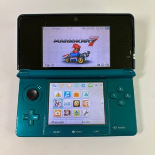 Nintendo 3DS con giochi e caricatore