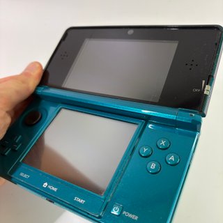 Nintendo 3DS con giochi e caricatore