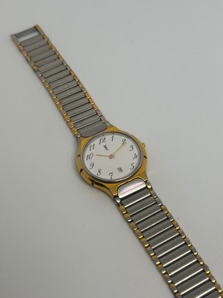 Orologio Yves Saint Laurent e Penna