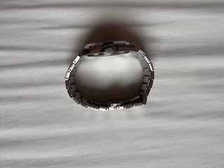 Reloj Eyebond esfera verde y correa plateada