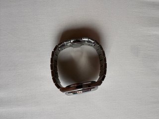Reloj Eyebond esfera verde y correa plateada