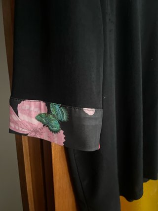 Conjunto 2 piezas: top negro y falda mariposas
