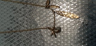 Collana Pilgrim dorata con ciondoli
