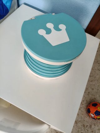 WC portátil infantil azul con corona