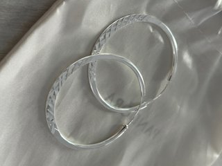 Orecchini cerchio argento 925 effetto luminoso
