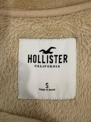 Sudadera beige con cremallera