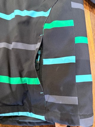 Chaqueta Klimanock Negra y Turquesa Rayas Niño.