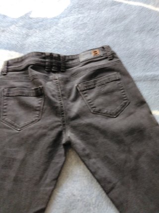 Pantalones vaqueros negros rasgados tallan como M