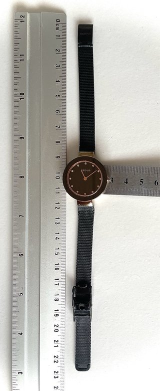 Reloj Bering Cerámica Negro y Dorado Mujer
