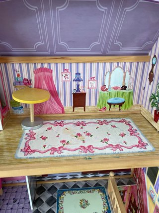 Casa de muñecas de madera