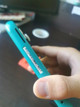 Switch Lite con giochi, non trattabile