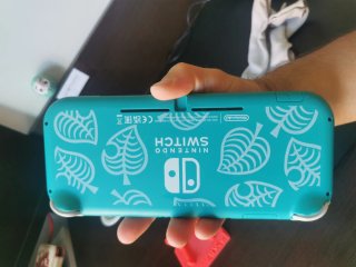 Switch Lite con giochi, non trattabile