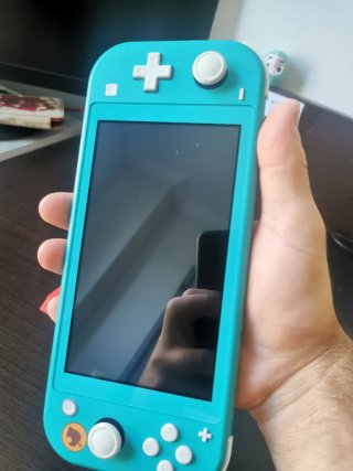 Switch Lite con giochi, non trattabile