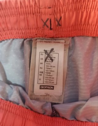 Pantalón corto deportivo azul y naranja Domyos