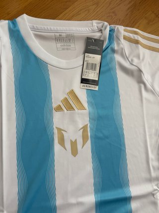 Camiseta logo M dorado talla M