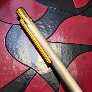 Bolígrafo Cartier Santos Acero y Oro