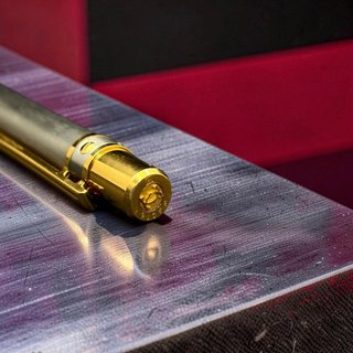 Bolígrafo Cartier Santos Acero y Oro