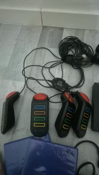 PS2 Slim Negra + Lote Accesorios
