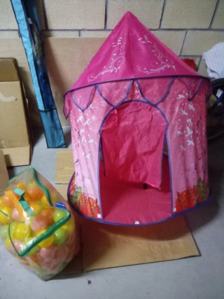 Carrito de compras y peluche rosa
