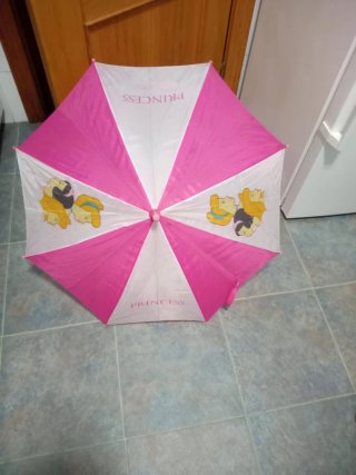 Carrito de compras y peluche rosa