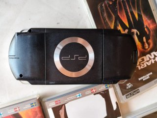 PSP Negra con 10 películas y 1 Juego UMD