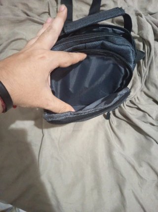 Bandolera gris