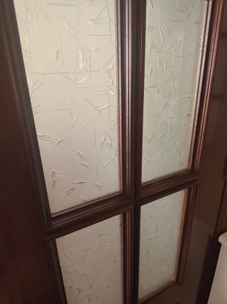 Puerta doble madera acristalada