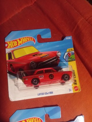 Lote 4 coches Hot Wheels: Camaro, Lotus, Nomad, Ra