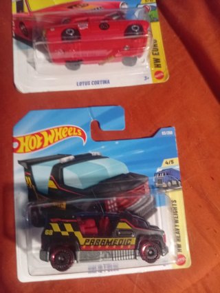 Lote 4 coches Hot Wheels: Camaro, Lotus, Nomad, Ra