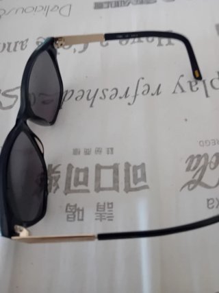 Occhiali da sole donna Nau neri
