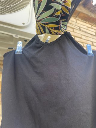 Body negro atado al cuello de Stradivarius