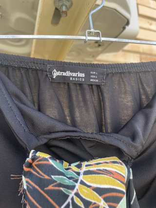 Body negro atado al cuello de Stradivarius