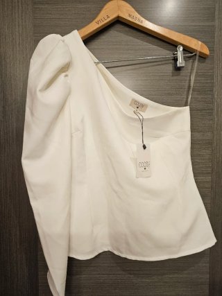 ​Top asimétrico blanco Coosy - Manga abullonada (T