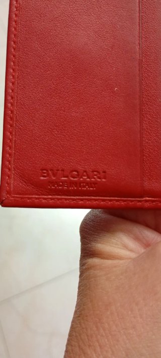 Portafoglio donna Bulgari rosso con cerchio dorato