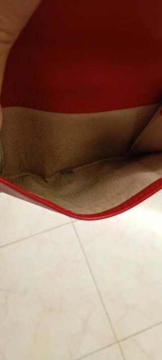 Portafoglio donna Bulgari rosso con cerchio dorato